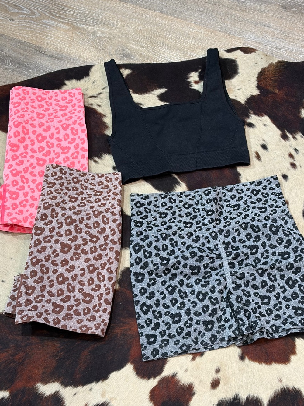 4 piece never worn Well Being tank/bra and 3 biker shorts no front seam cheetah